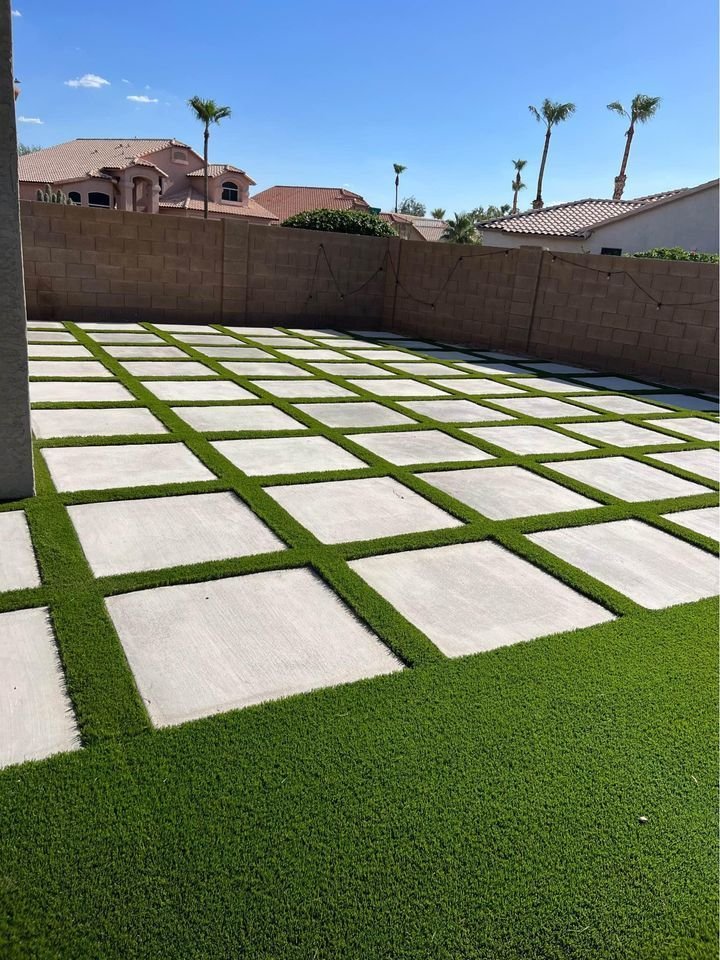 concrete patio pavers paired with artificial grass