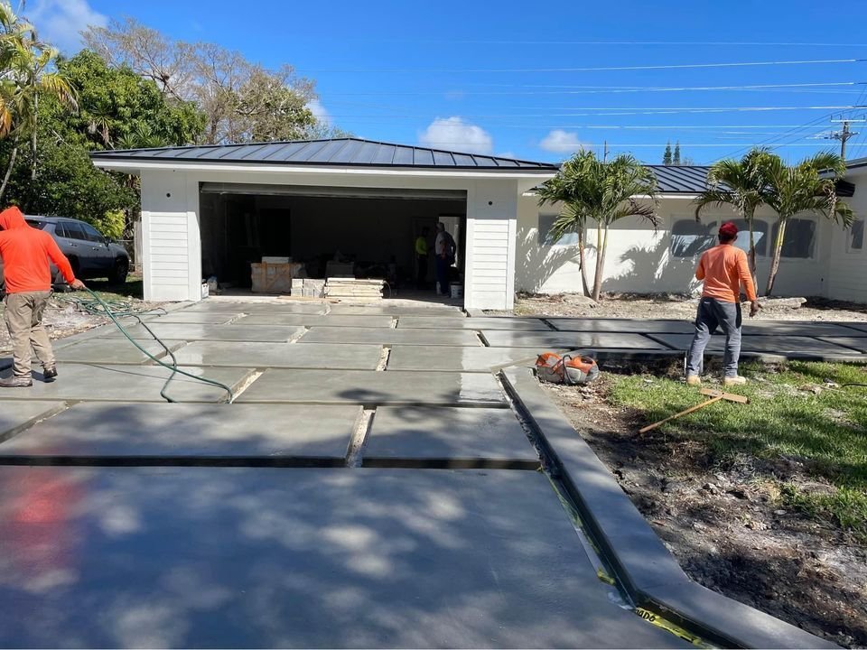 local contractors installing concrete and artificial grass driveway in Phoenix, AZ